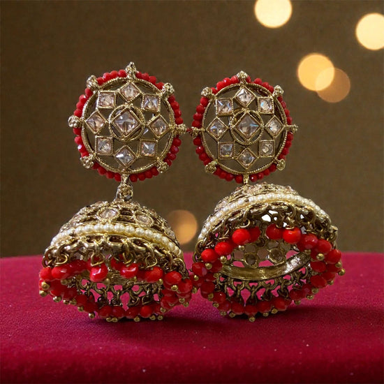 Dual-Tone Kundan Jhumkas: elegant jhumka earrings with geometric stone work and intricate gold detailing.
