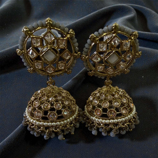 • Classic Kundan-Inspired Jhumka Earrings with Pearl Accents
• Traditional Gold-Toned Filigree Jhumki with Seed Pearl Detailing
• Ornate Meenakari-Style Geometric Stud Jhumkas