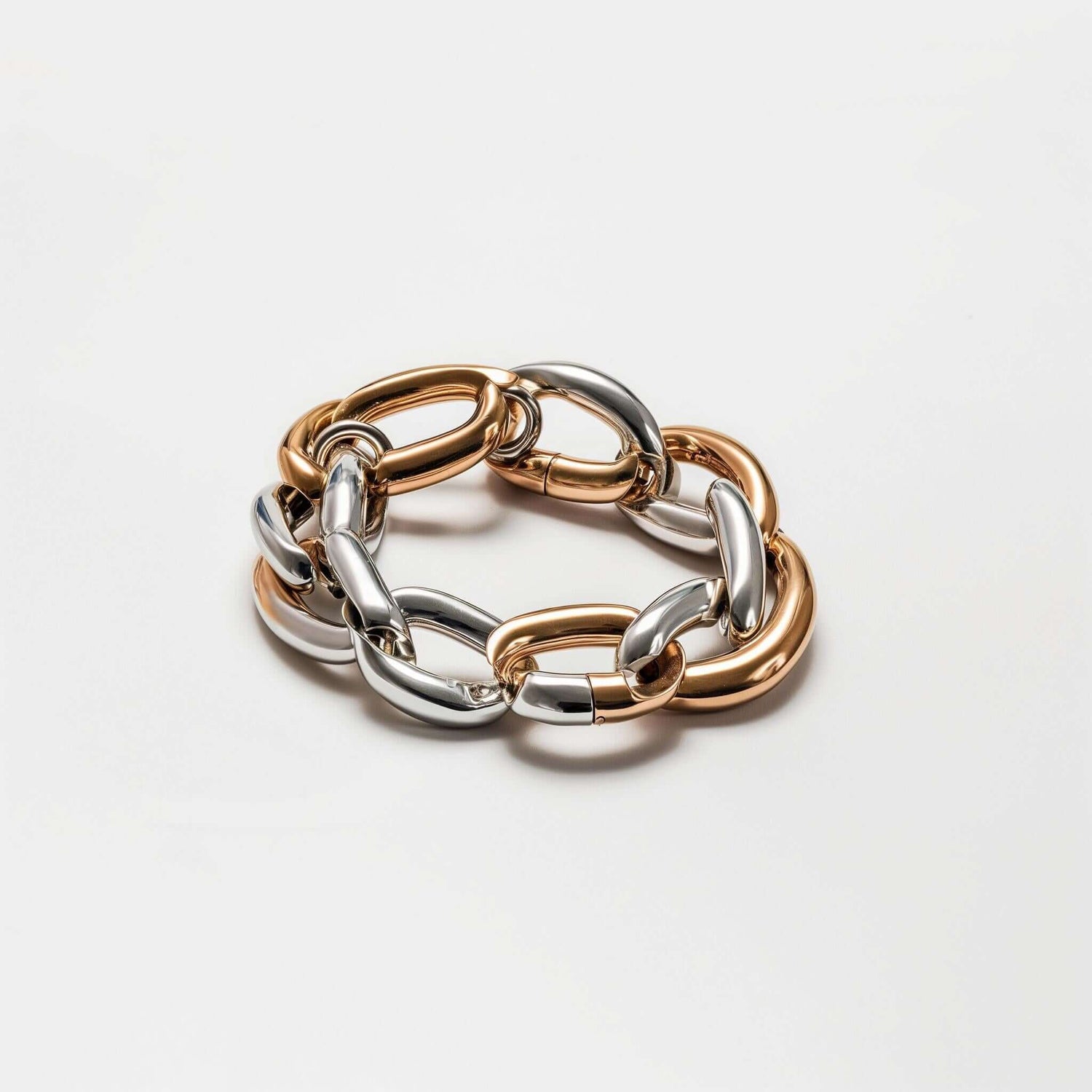 Two Tone Chain Bracelet featuring a stylish mix of silver and gold links on a neutral background.
