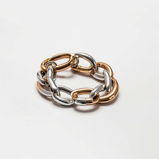 Two Tone Chain Bracelet featuring a stylish mix of silver and gold links on a neutral background.