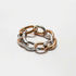 Two Tone Chain Bracelet featuring a stylish mix of silver and gold links on a neutral background.